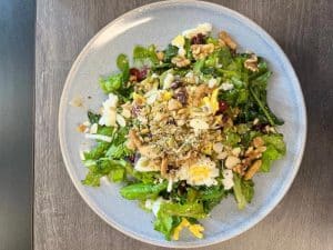 Hydroponic greens in a salad on a plate